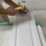 caulking kitchen cabinets