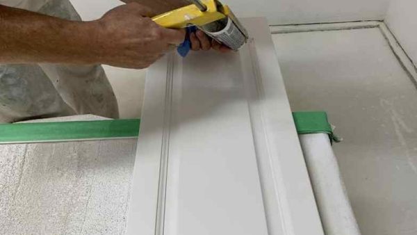 caulking kitchen cabinets