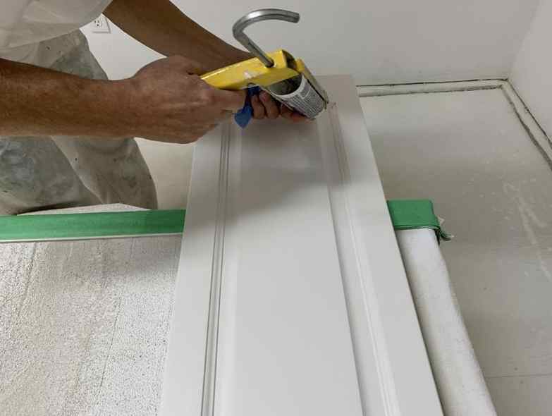 caulking kitchen cabinets